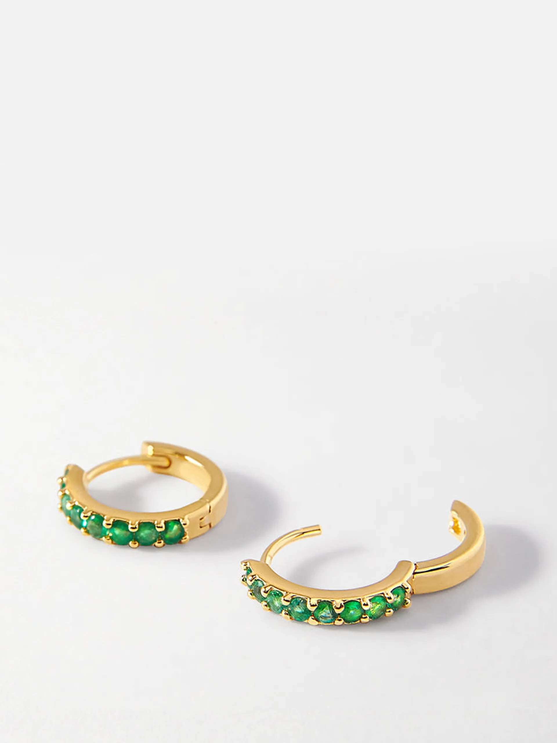 Emerald pavé huggie earrings