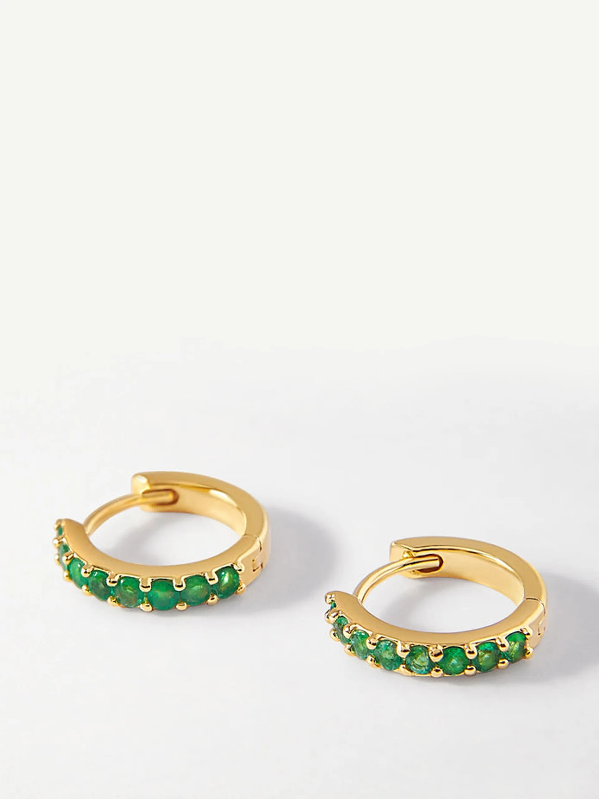 Emerald pavé huggie earrings