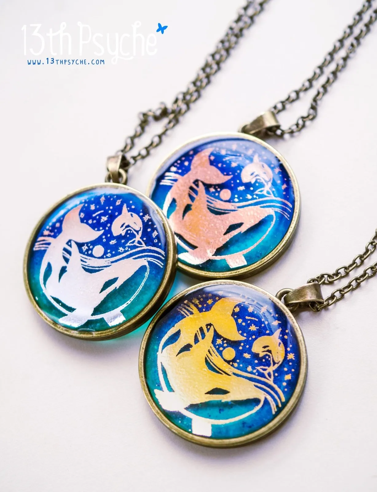 Illustrated orcas resin pendant necklace