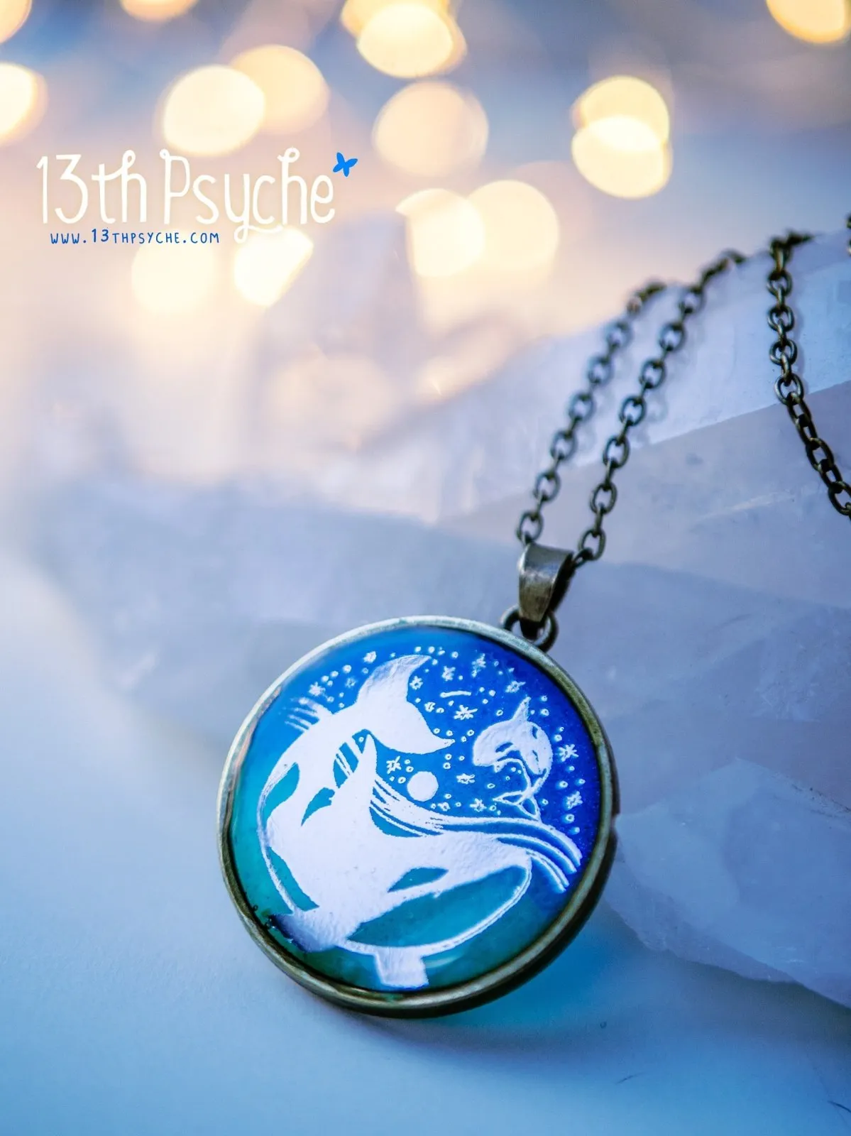 Illustrated orcas resin pendant necklace