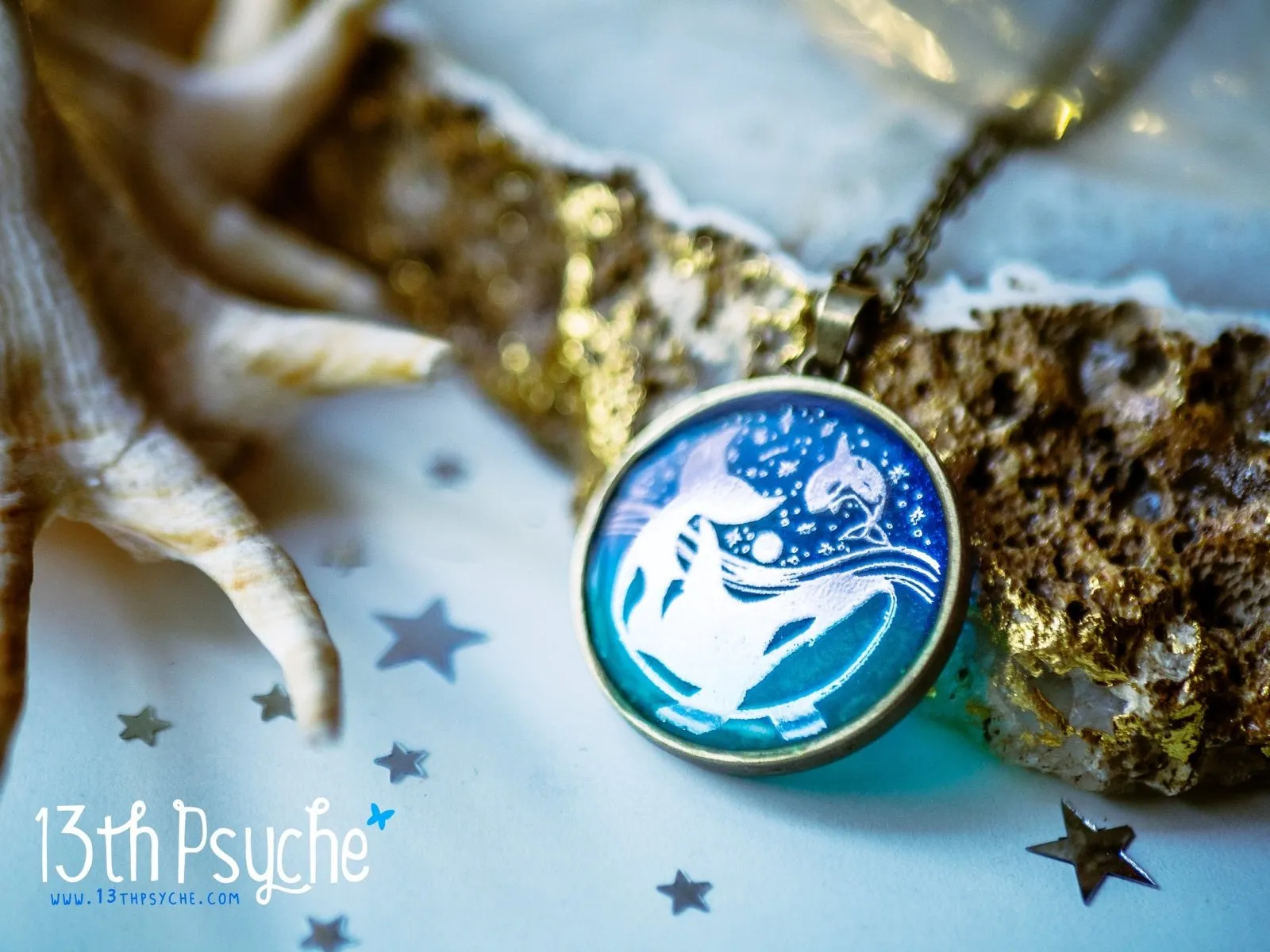 Illustrated orcas resin pendant necklace